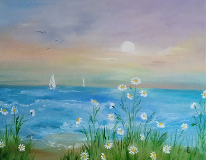 На побережье